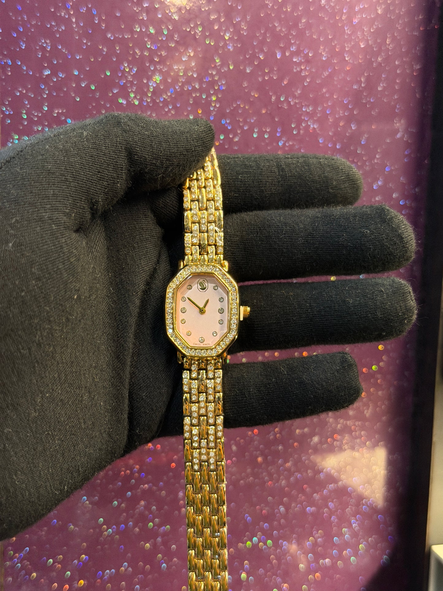 SWAROVSKI- LADIES WATCH - GOLDEN CHAIN WITH LIGHT PEACH DIAL - STONE WORK