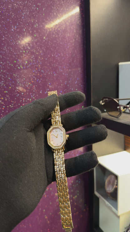 SWAROVSKI- LADIES WATCH - GOLDEN CHAIN WITH LIGHT PEACH DIAL - STONE WORK